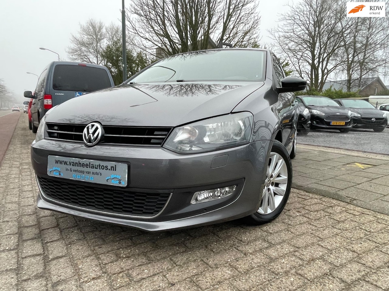 Volkswagen Polo - 1.2-12V Style A-C Elek Pakket Lmv Navi Pdc - AutoWereld.nl