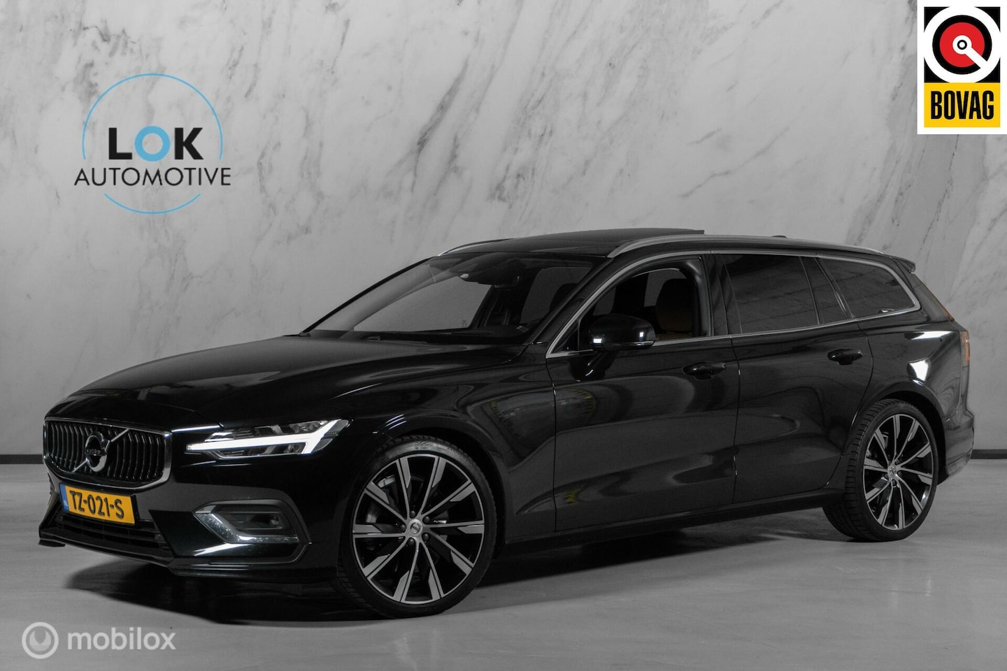 Volvo V60 - 2.0 T5 R-Design|PANO|H&K|HUD|LEDER|KEYLESS|ACC| - AutoWereld.nl