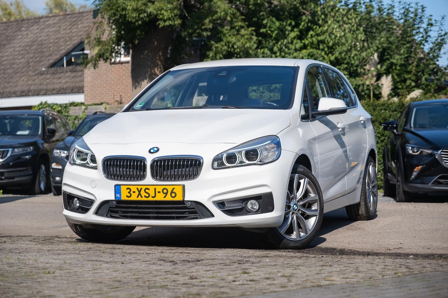 BMW 2-serie Active Tourer - (f45) 218i HIGH EXECUTIVE LEER RIJKLAAR BOVAG - AutoWereld.nl