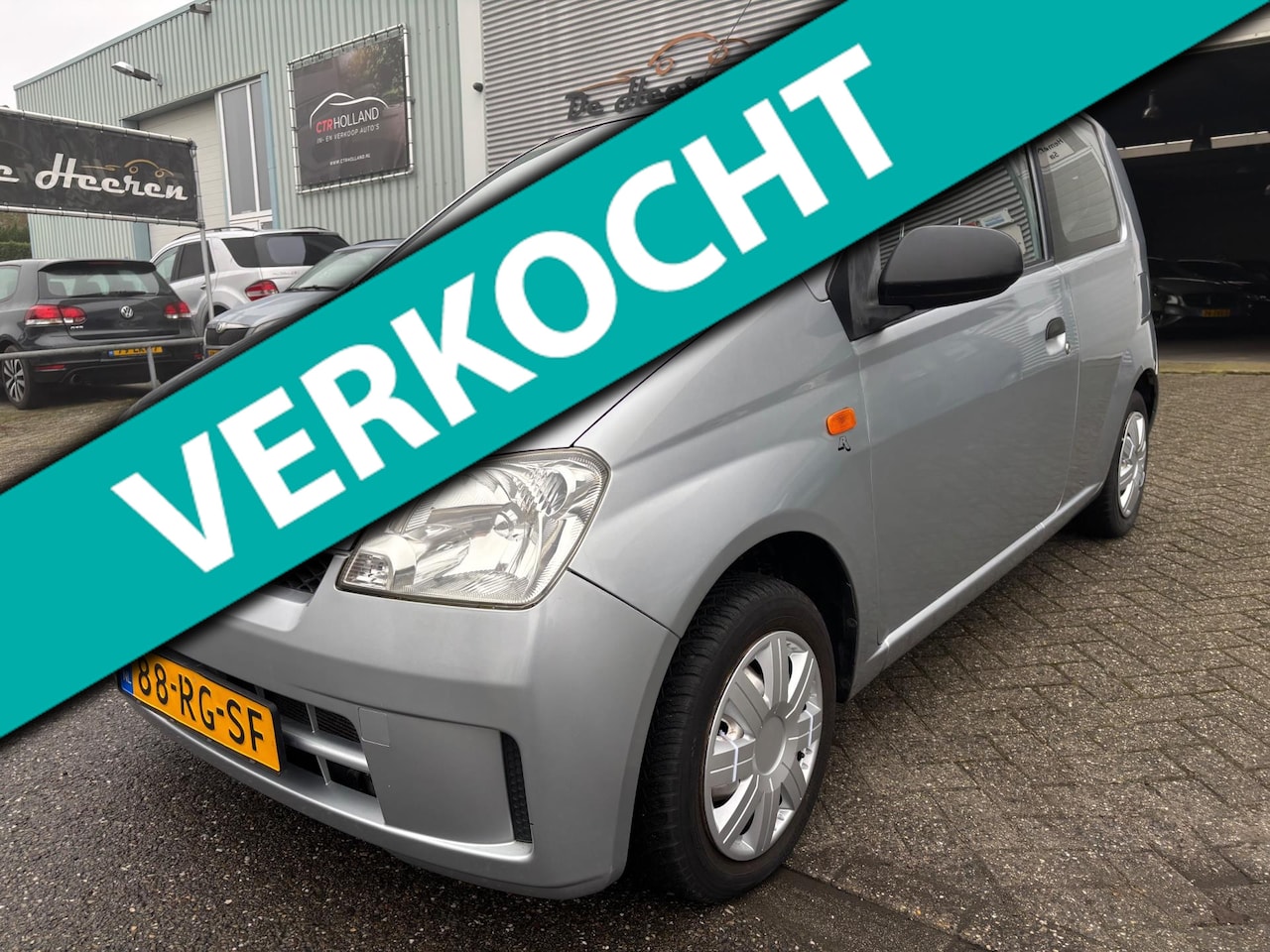 Daihatsu Cuore - 1.0-12V Nagano Automaat 2eEigenaar. NW Apk - AutoWereld.nl