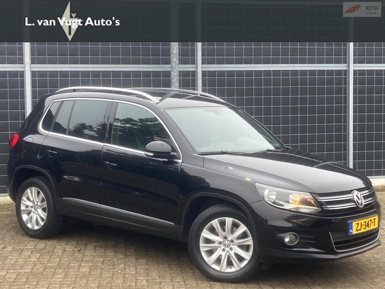 Volkswagen Tiguan - 1.4 TSI Sport&Style Automaat - AutoWereld.nl