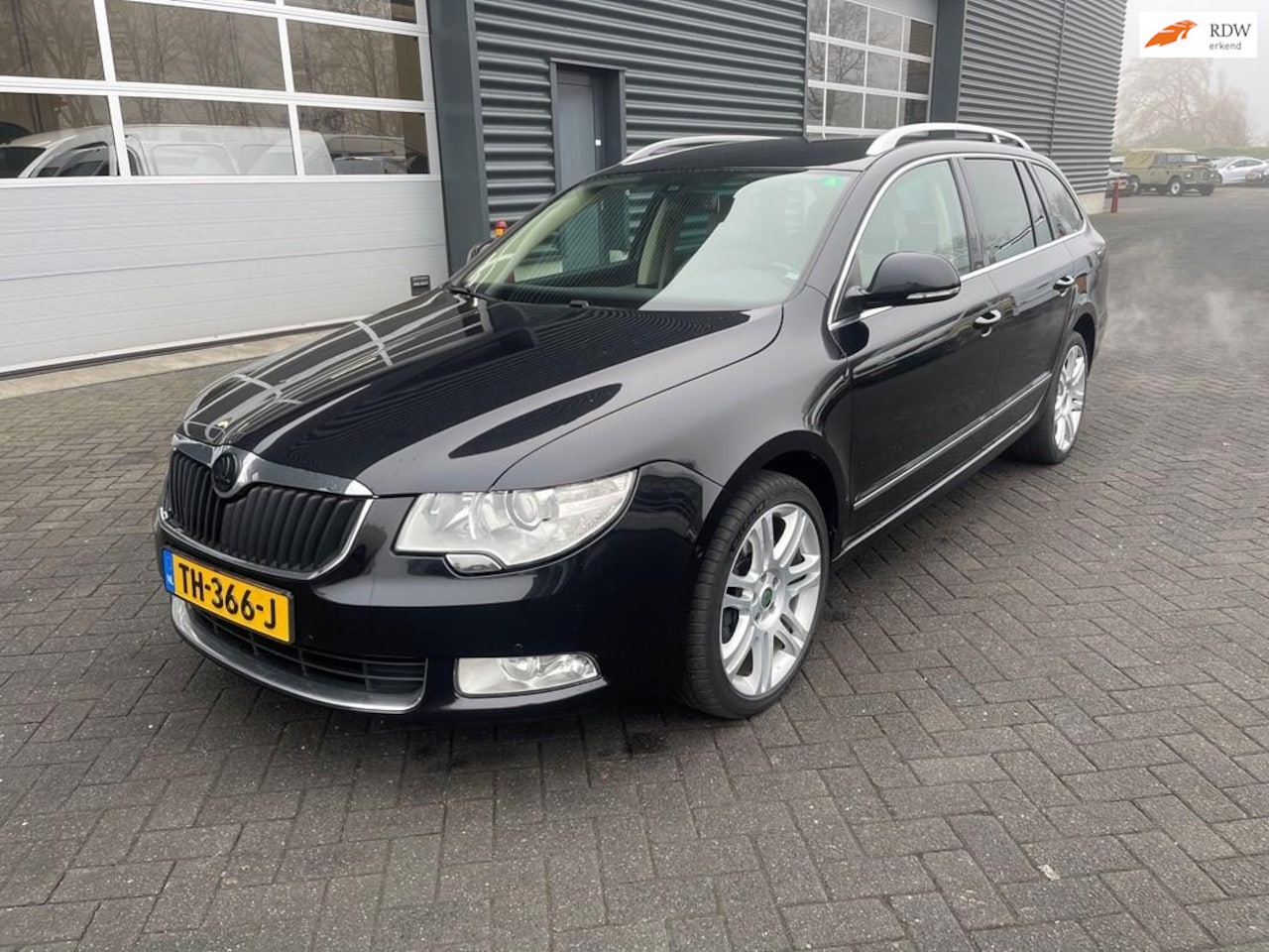 Skoda Superb Combi - 3.6 FSI Elegance 4x4 airco navi stoelverwarming - AutoWereld.nl