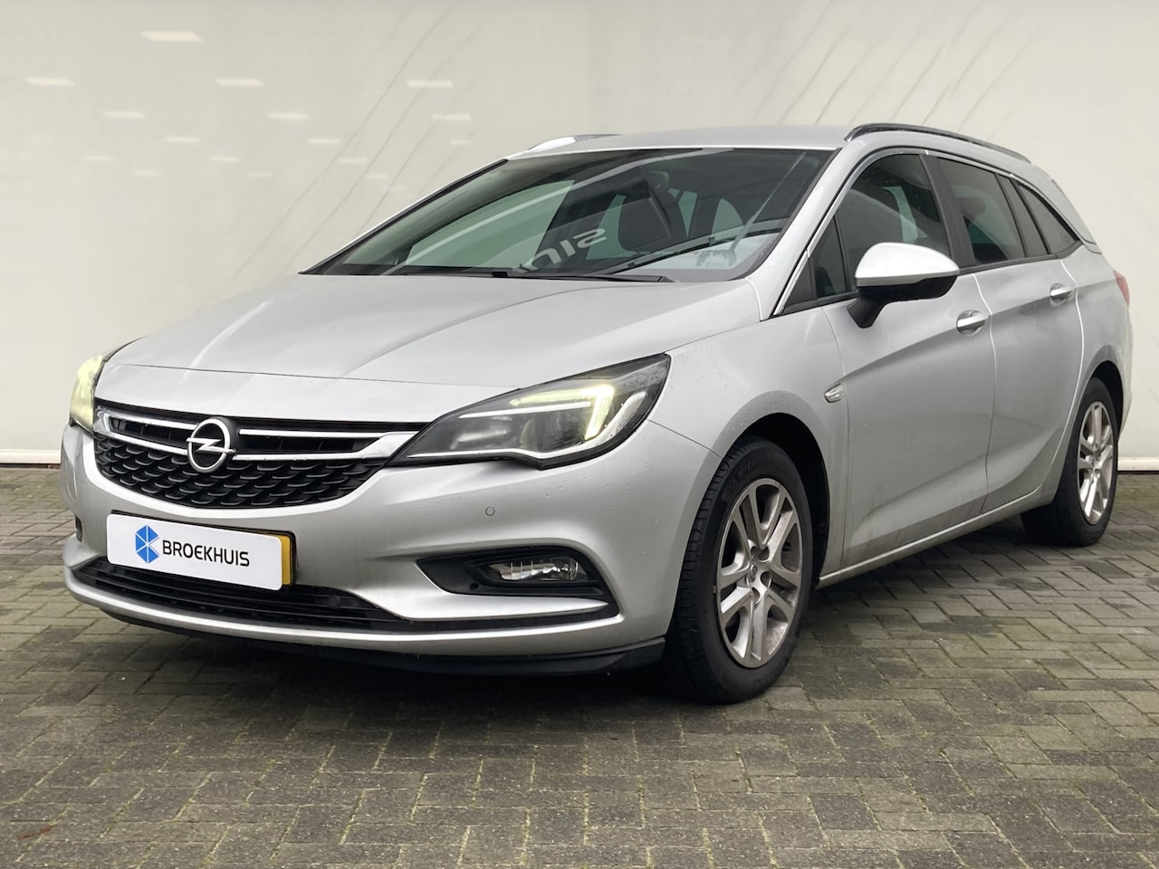 Opel Astra Sports Tourer - 1.0 Turbo Online Edition | Airco | Cruise | Navi | Pdc V&A | Trekhaak | - AutoWereld.nl