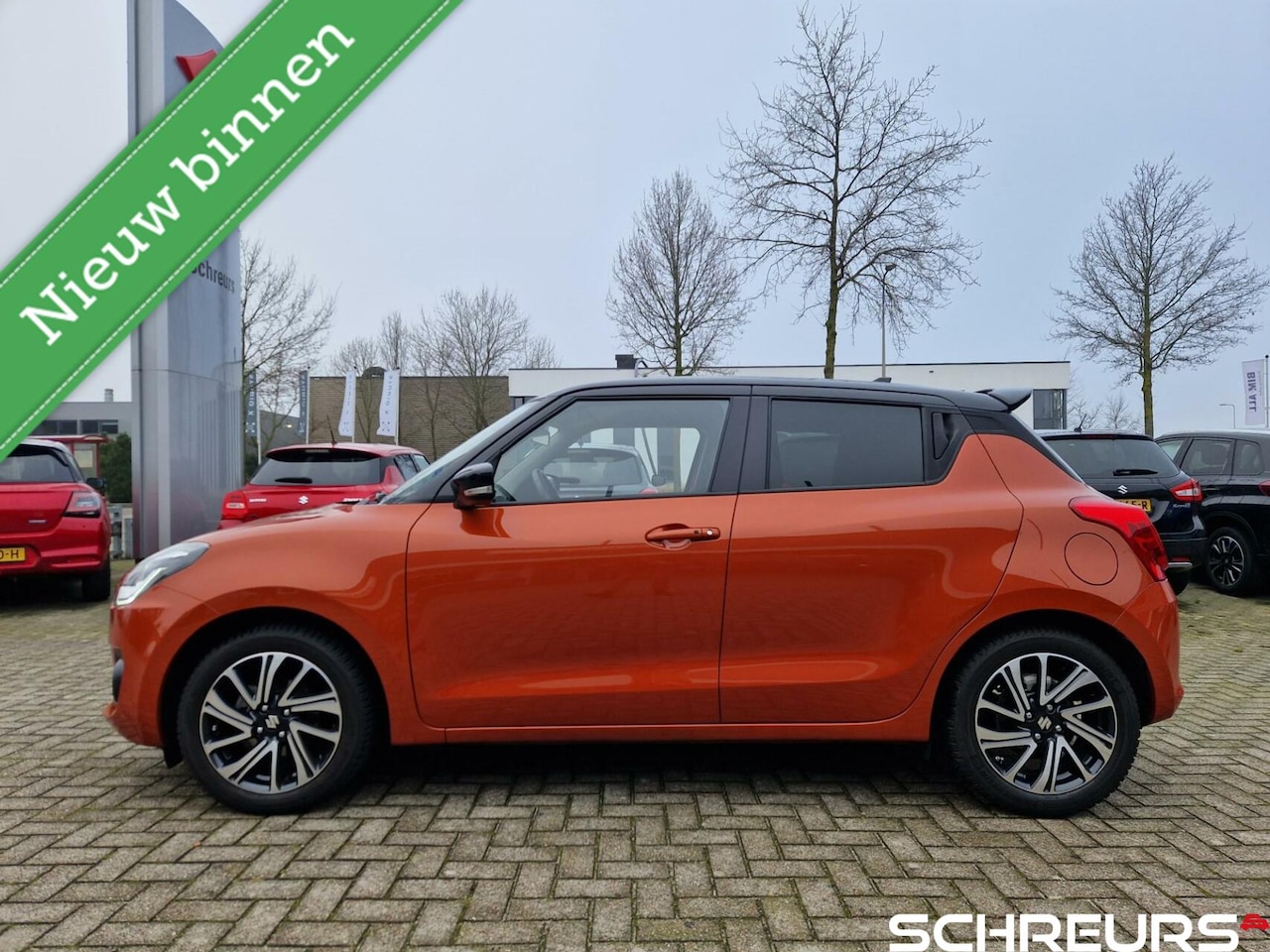 Suzuki Swift - 1.2 Style Smart Hybrid|Trekhaak|Dakspoiler|Armsteun|Audio upgrade|6 jaar garantie|Rijklaar - AutoWereld.nl