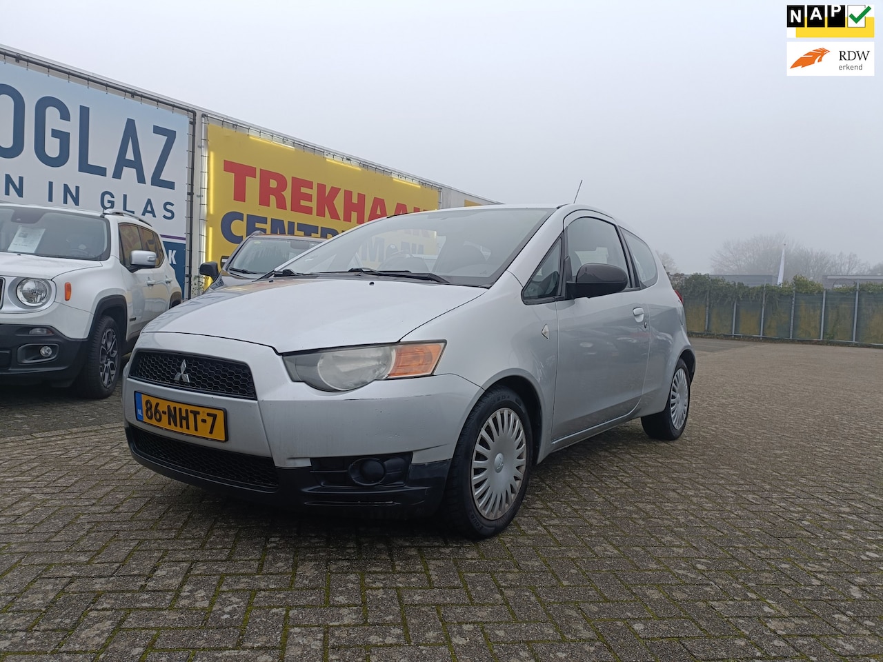 Mitsubishi Colt - 1.1 NAVIAGTIE/AIRCO/NAP - AutoWereld.nl