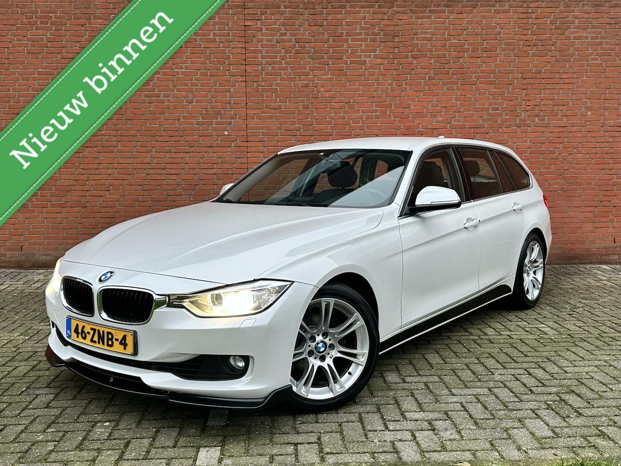 BMW 3-serie Touring - 320i High Executive TREKHAAK | NAVIGATIE - AutoWereld.nl