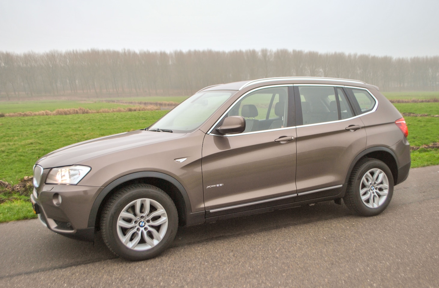 BMW X3 - 2.8i xDrive High Executive F25 Sparkling Bronze 6-cilinder 258pk Bruin leer - AutoWereld.nl