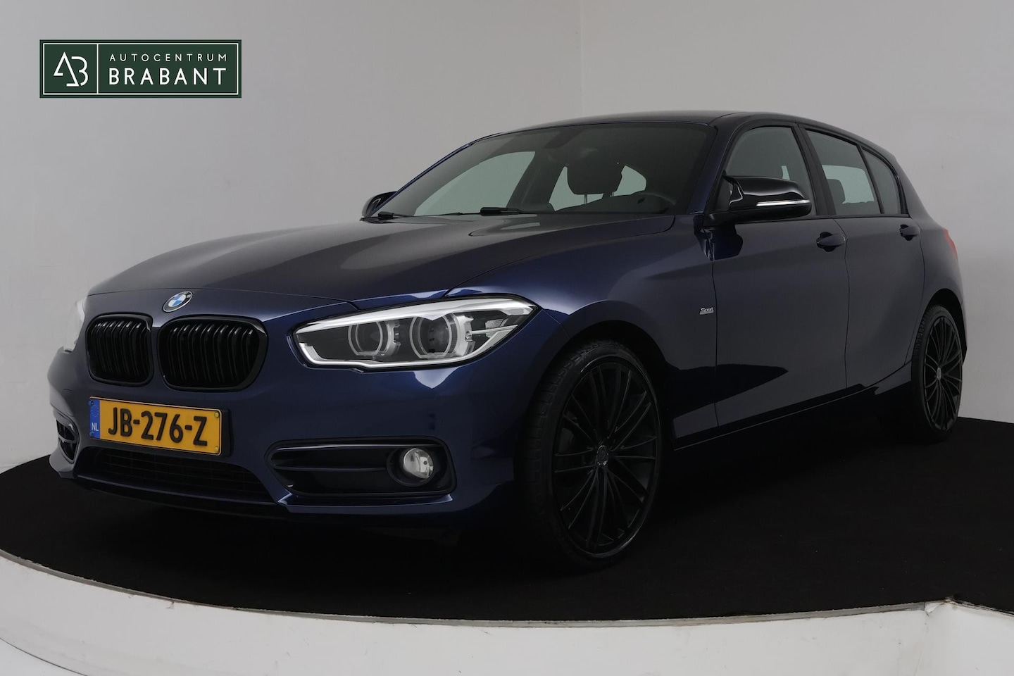 BMW 1-serie - 118i Corporate Lease Sport Automaat (STOELVERWARMING, CLIMA, PARKEERSENSOREN, NAVIGATIE, G - AutoWereld.nl