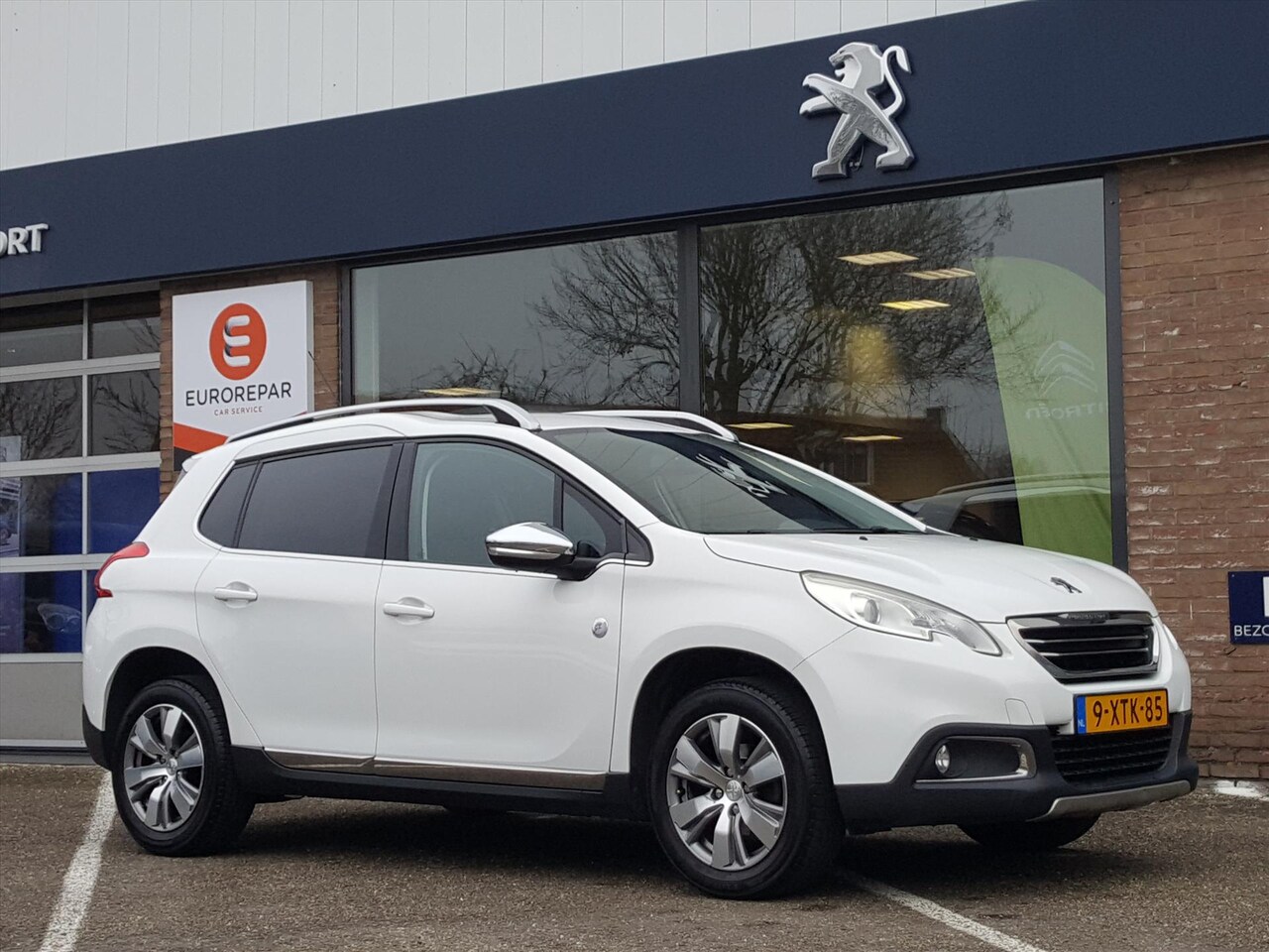 Peugeot 2008 - 1.2 PureTech 82pk Crossway TREKHAAK | Navigatie | Cruise & Climate control | Parkeersensor - AutoWereld.nl