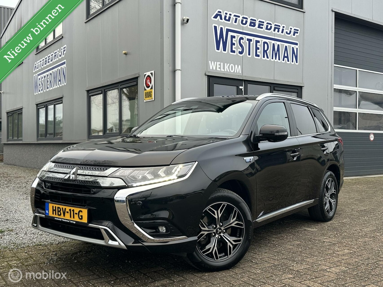 Mitsubishi Outlander - 2.4 PHEV S-Edition Leer Schuifdak Sound Trekhaak Led Keyless etc. - AutoWereld.nl