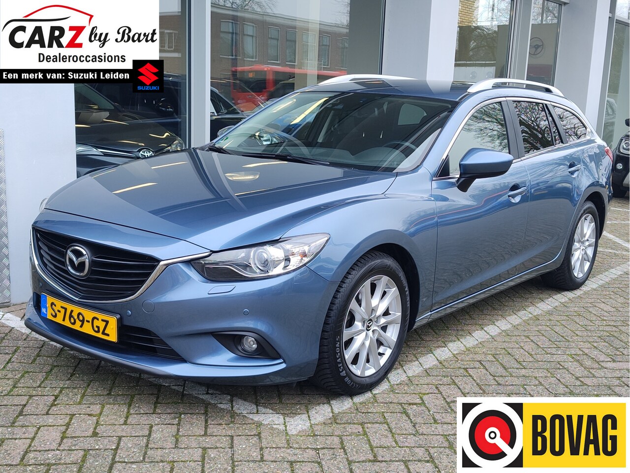 Mazda 6 Sportbreak - 2.0 SKYACTIV-G SKYLEASE+ Dodehoek | Rijstrooksensor | Stoelverwarming | Keyless - AutoWereld.nl