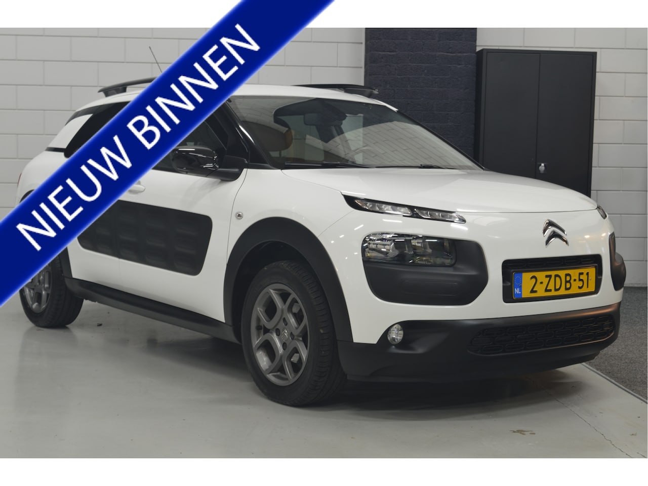 Citroën C4 Cactus - 1.2 e-VTi Shine // AUTOMAAT // 85.000 km // PANO // TREKHAAK // NAVI // CAMERA // CLIMA // - AutoWereld.nl