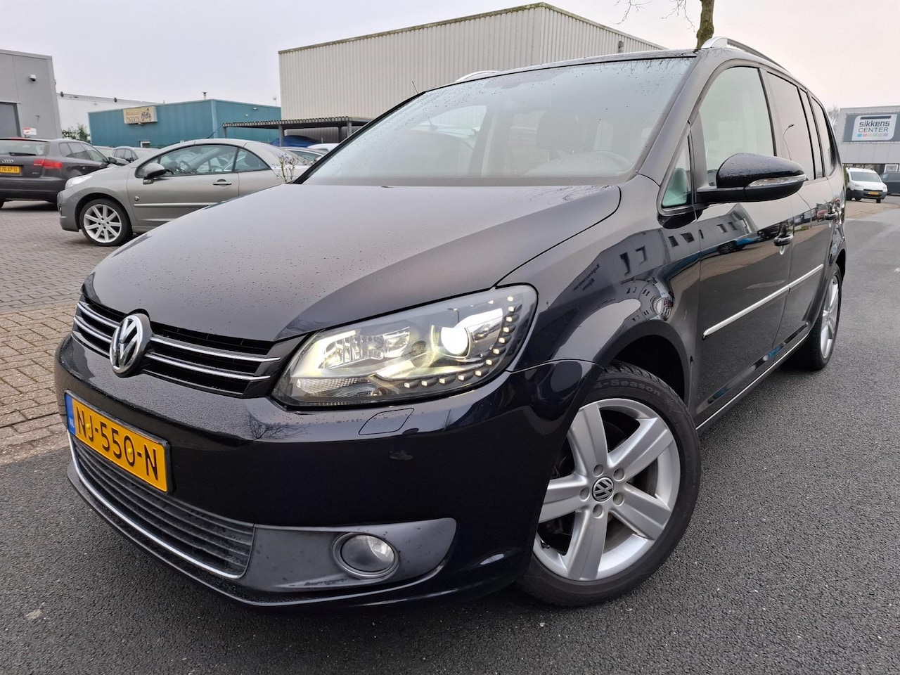 Volkswagen Touran - 1.4 TSI Highline AUTOMAAT/CLIMA/CRUISE/XENON! - AutoWereld.nl