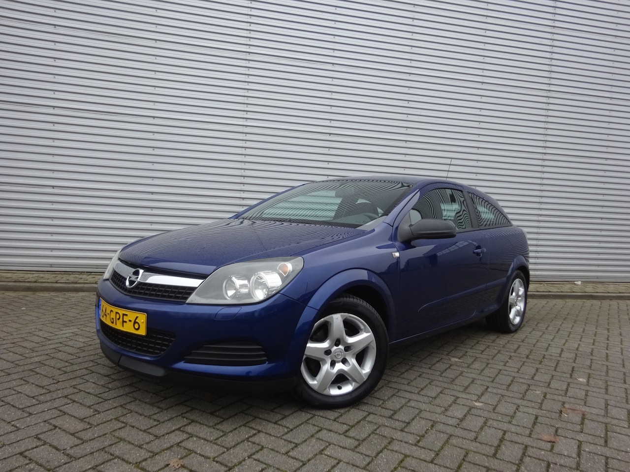 Opel Astra GTC - 1.8 Business Airco / Elektr. ramen / Cruise control / NAP - AutoWereld.nl