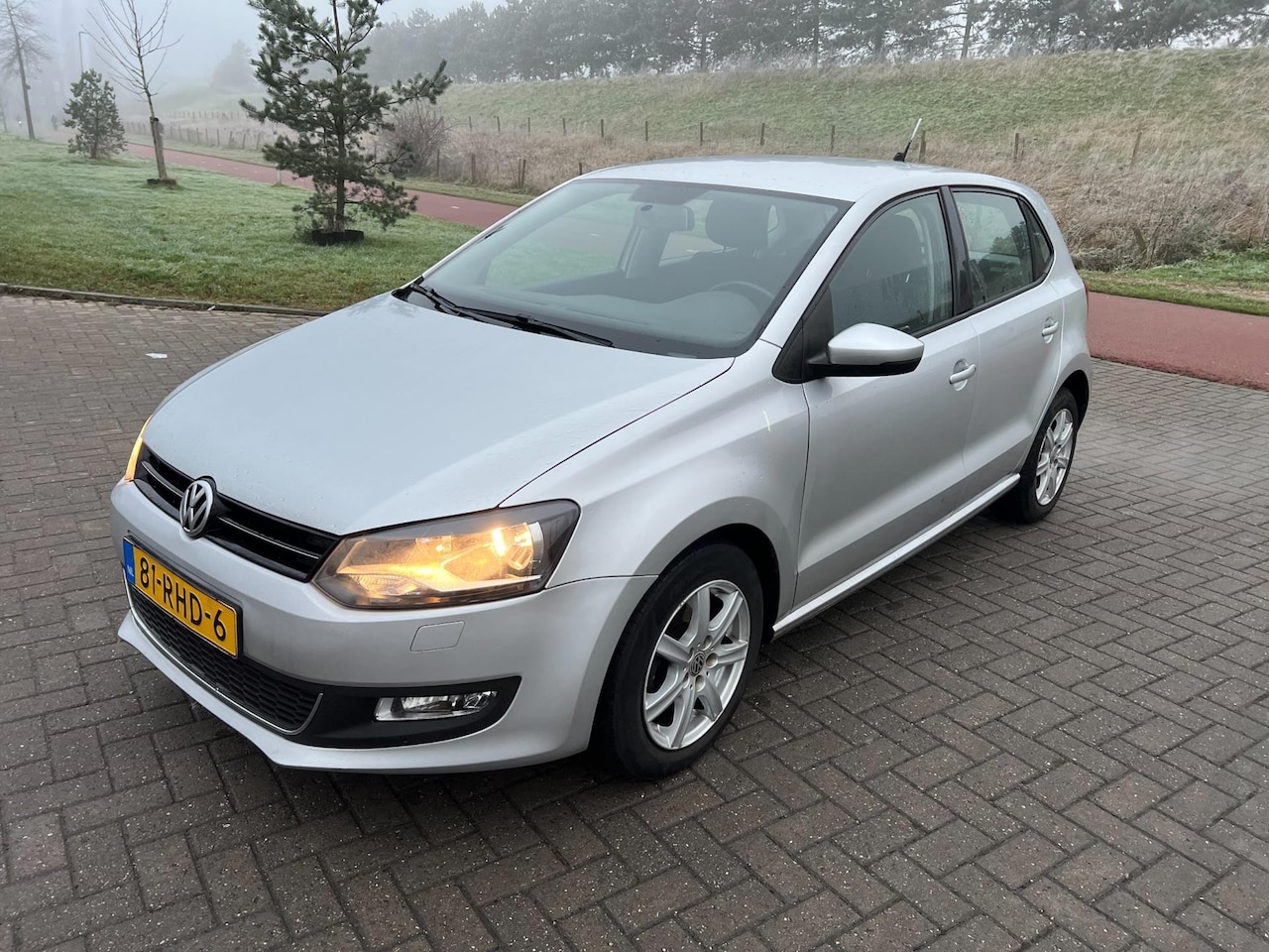 Volkswagen Polo - 1.2 TSI Highline 5D DSG Bj 2011 - AutoWereld.nl