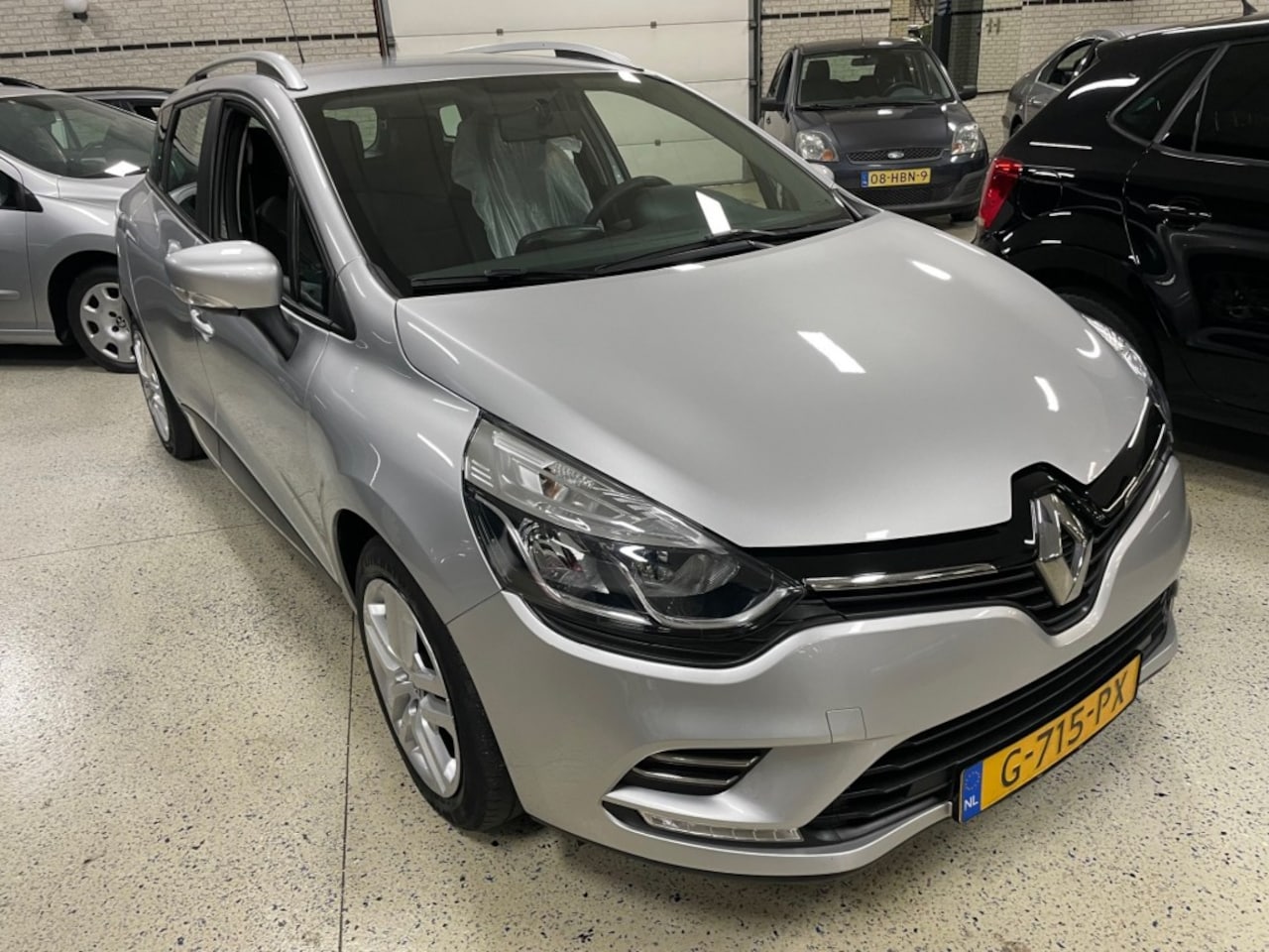 Renault Clio - 0.9 TCE AIRCO / CRUISE / NAVI / MULTIMEDIA / PDC / LED - AutoWereld.nl