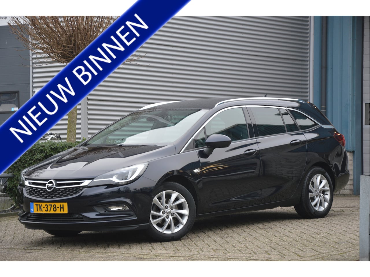 Opel Astra Sports Tourer - 1.4 INNOVATION | NAVI | CAMERA | LED | PDC | TREKHAAK } ENZ - AutoWereld.nl