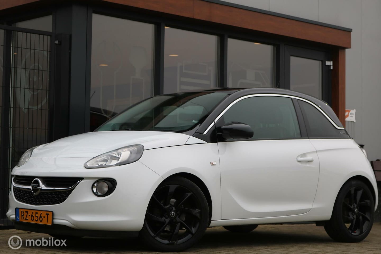 Opel ADAM - 1.2 Glam | Cruise | Clima | Half leder | - AutoWereld.nl