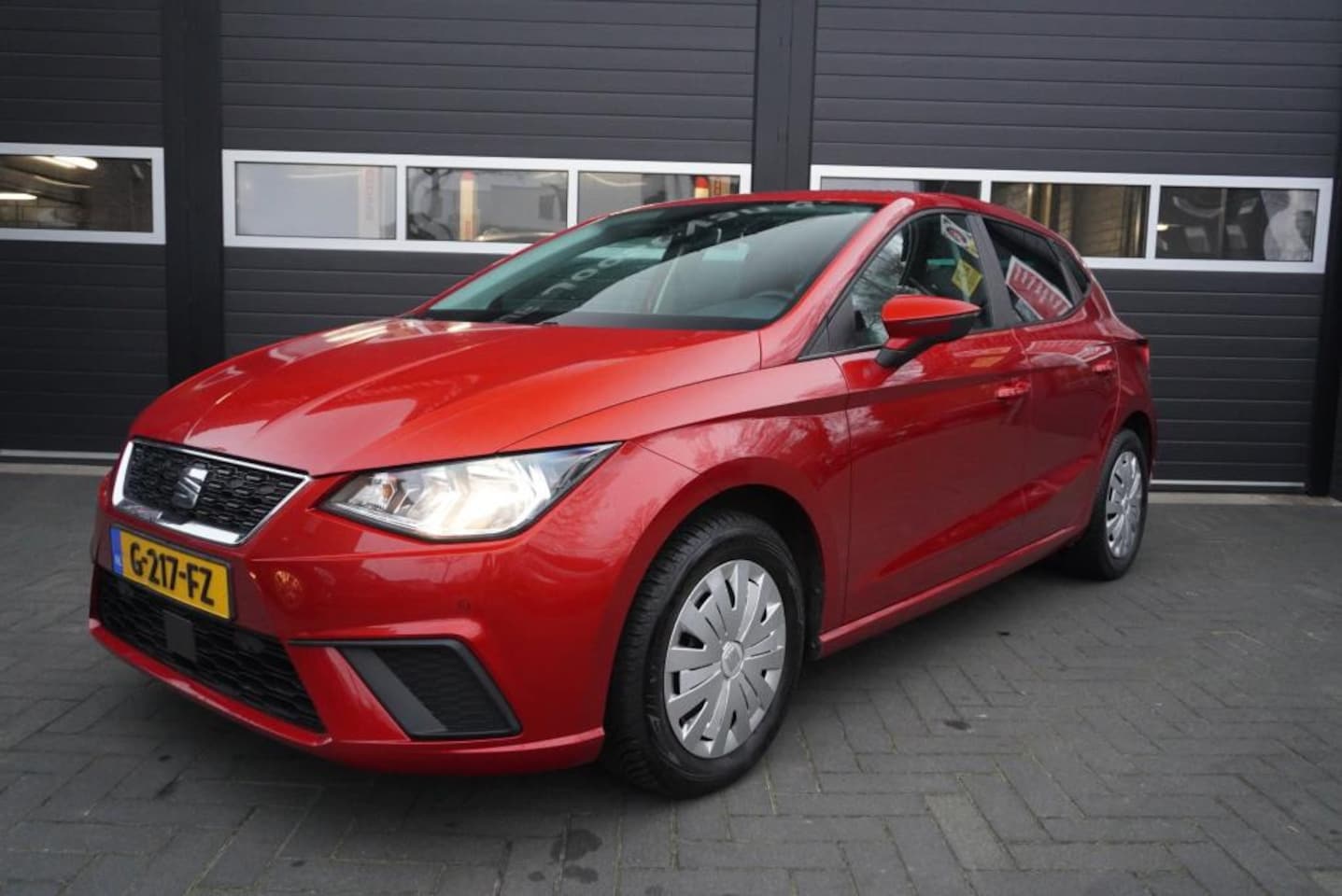 Seat Ibiza - 1.0 TSI Style Business Intense Airco/Camera/Trekhaak/CC/Navi/Park.sensoren - AutoWereld.nl