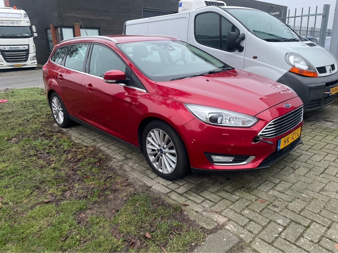 Ford Focus Wagon - 1.0 Titanium Edition | Lees AD - AutoWereld.nl