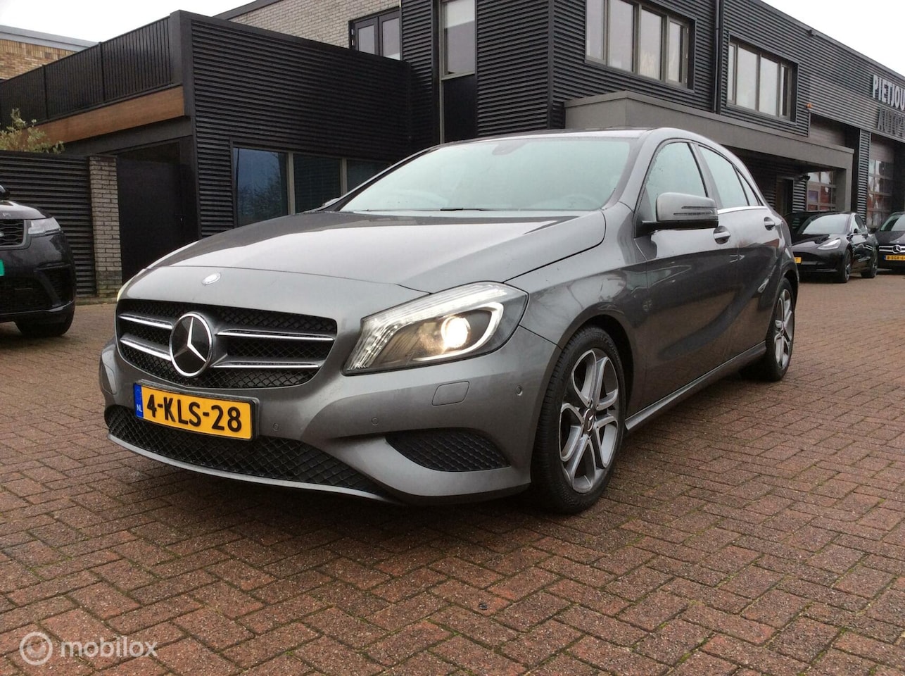 Mercedes-Benz A-klasse - 180 Ambition 4U3 17"Lm Vlg Nap half leder Nav - AutoWereld.nl