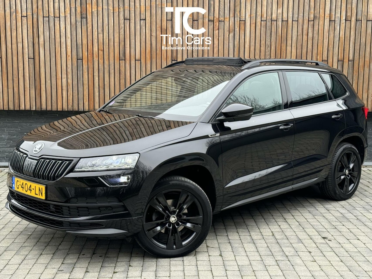 Skoda Karoq - 1.5 TSI 150pk Sportline Automaat | Panoramadak | LED verlichting | Stoelverwarming | Voorr - AutoWereld.nl