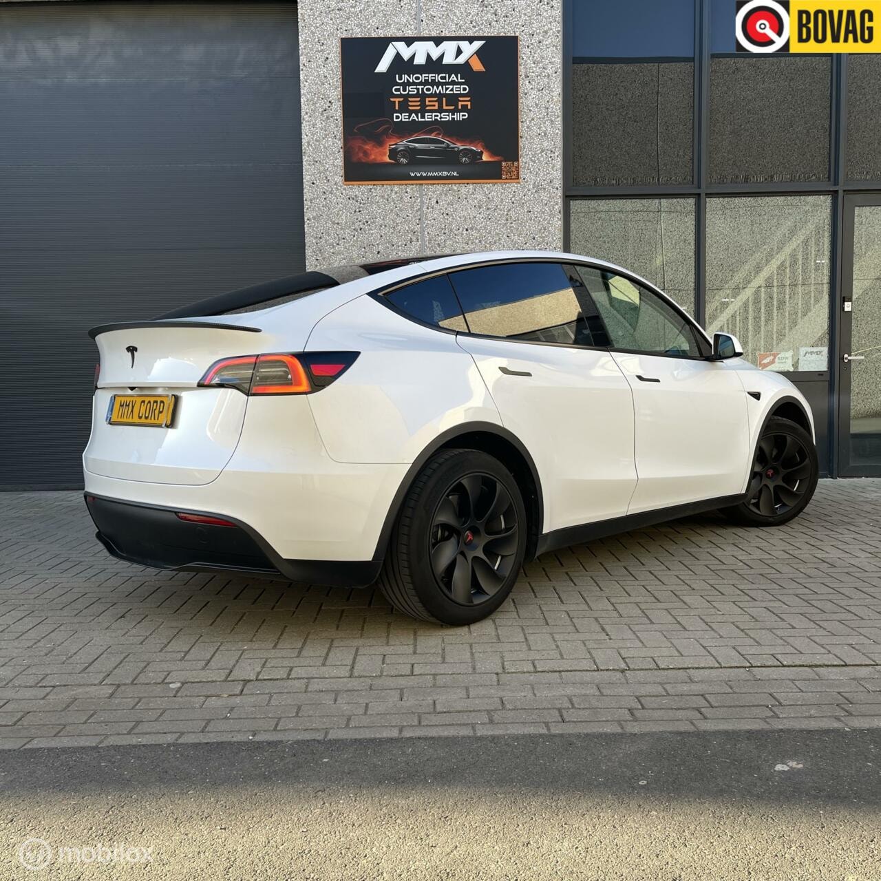 Tesla Model Y - RWD 60kWh WIT INTERIEUR MMX PACK - AutoWereld.nl