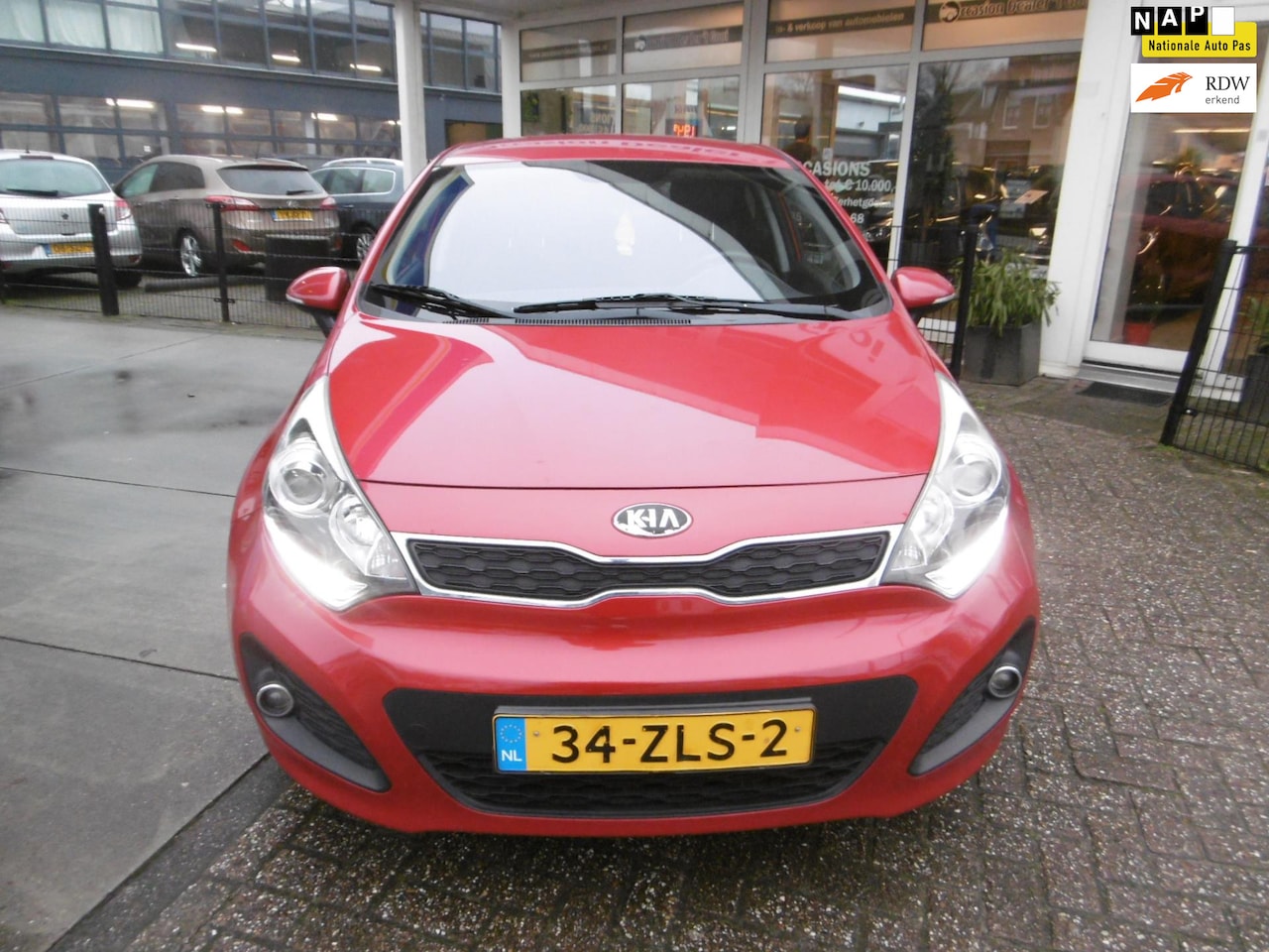 Kia Rio - 1.2 CVVT 86pk 5-deurs Airco Cruise Trekhaak LED Zuinig A-label - AutoWereld.nl