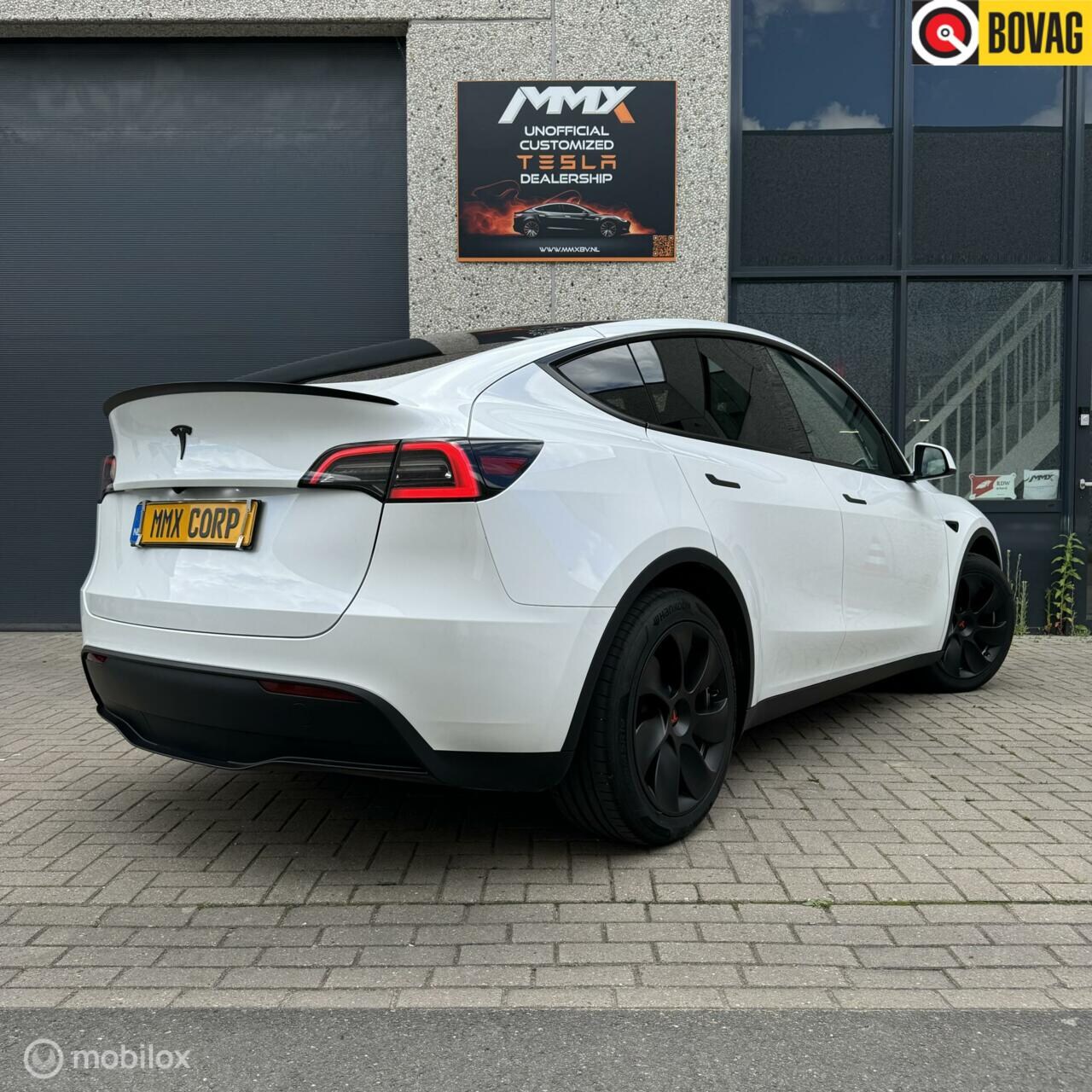 Tesla Model Y - RWD 60kWh WIT INTERIEUR MMX PACK - AutoWereld.nl