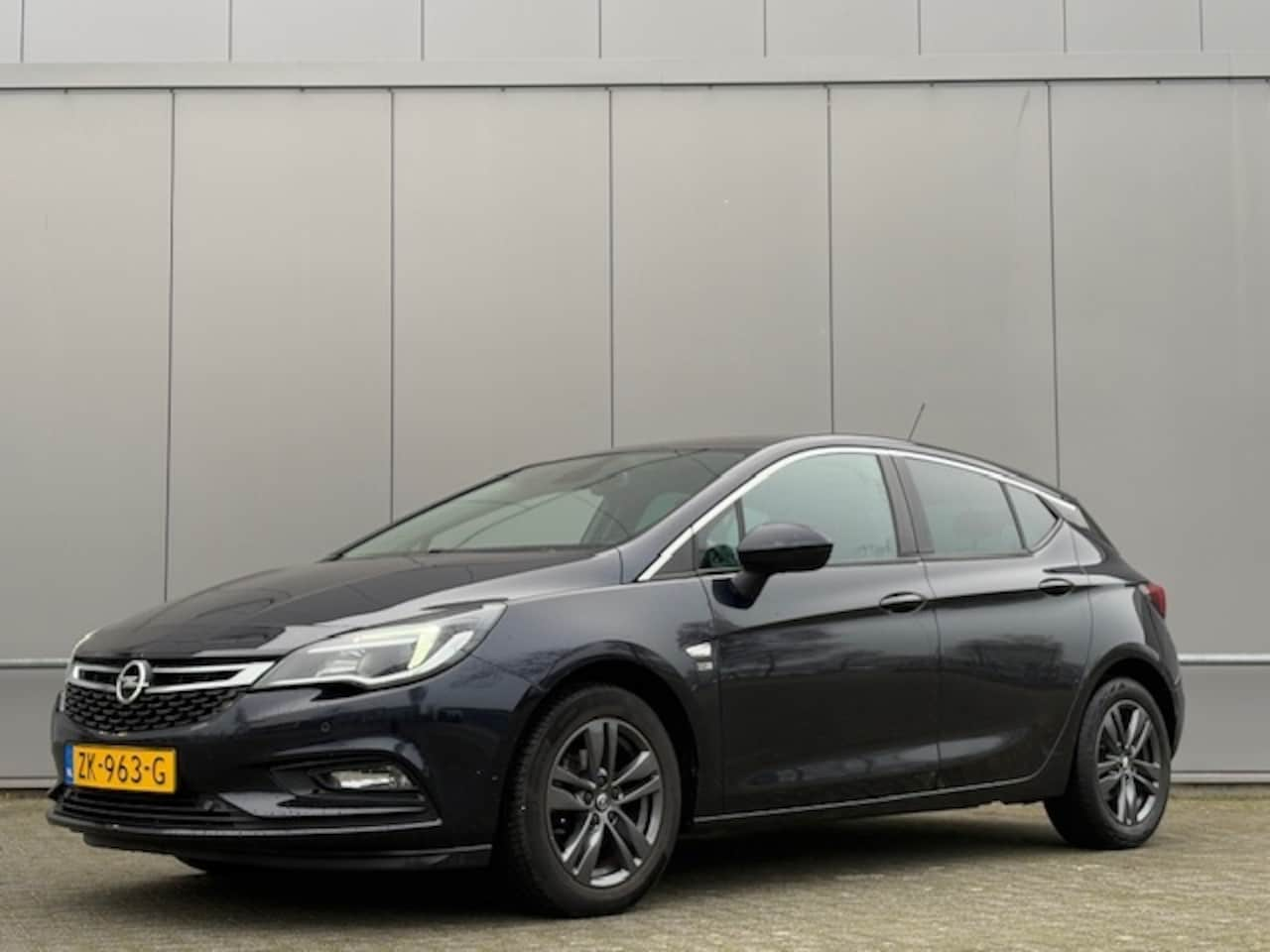 Opel Astra - 1.4 T. - automaat - nap - airco - navi - cruise - AutoWereld.nl