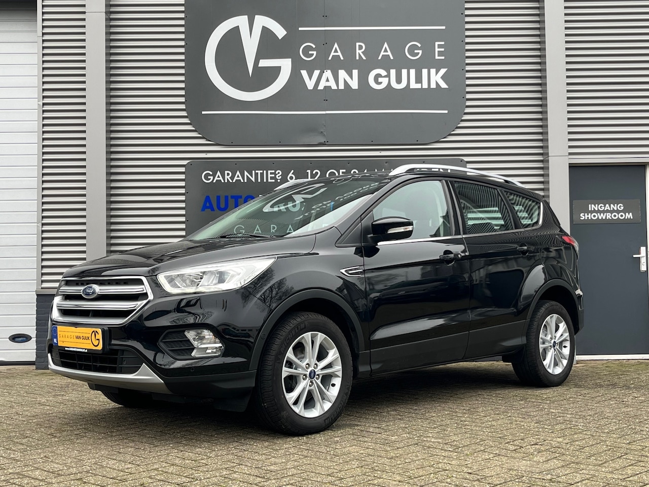 Ford Kuga - 1.5 150PK Ecoboost Navi,Clima,Cruise,Bluetooth,Stoel+Stuurverwarming,Parkeerhulp,Parkeerse - AutoWereld.nl