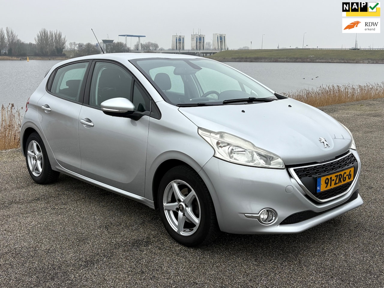 Peugeot 208 - 1.2 VTi Envy/Clima/Parksnr/NL/Apk/5DRS/Top Auto - AutoWereld.nl