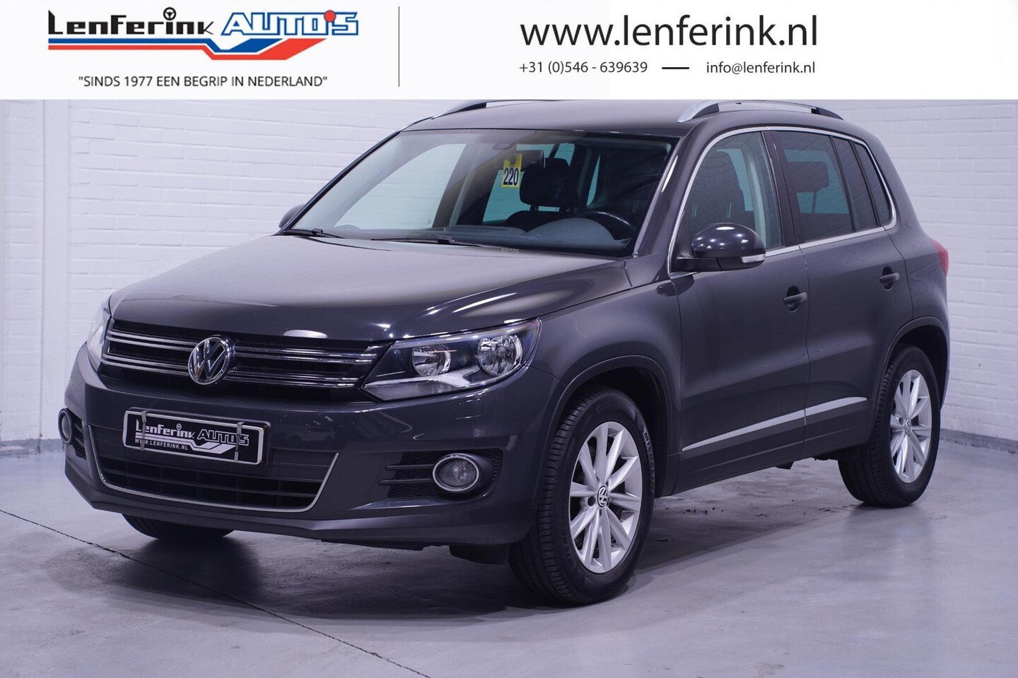 Volkswagen Tiguan - 1.4 TSI Sport&Style Navi Stoelverwarming Cruise - AutoWereld.nl