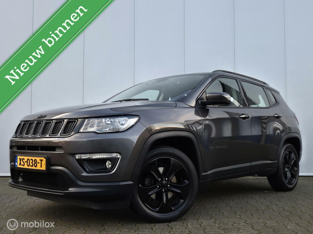 Jeep Compass - 1.4 MULTIAIR NIGHT EAGLE/HALF LEDER/KEYLESS/CAMERA/CARPLAY/18''LMV - AutoWereld.nl