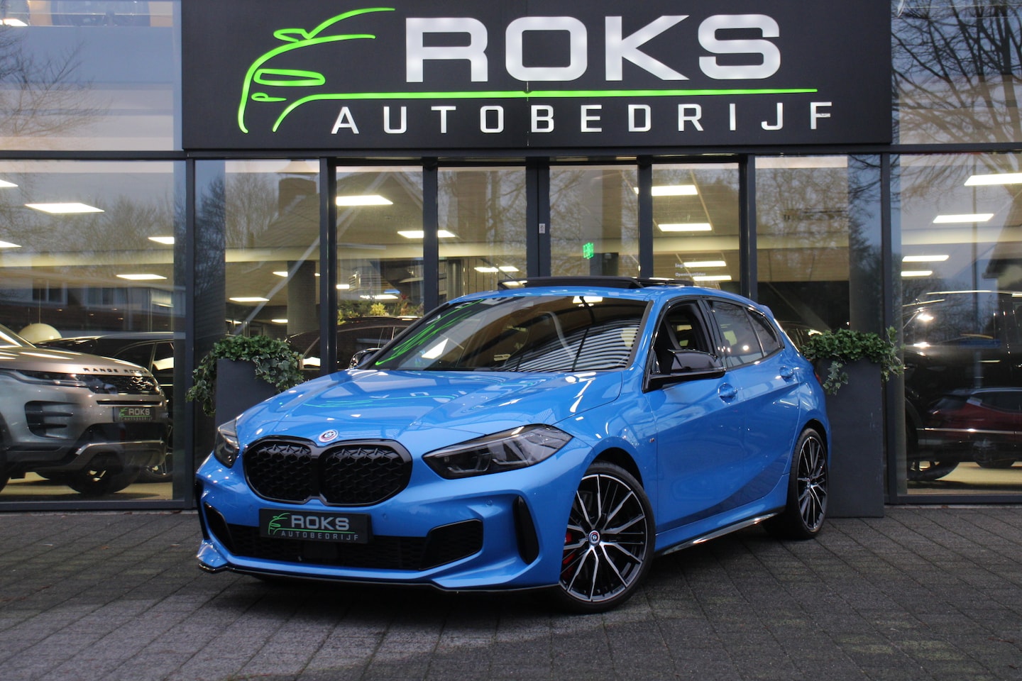 BMW 1-serie - M135i xDrive M-PerformancePack Leder/Headup/Keyless/Sfeerverlichting/HarmanKardon/Panorama - AutoWereld.nl