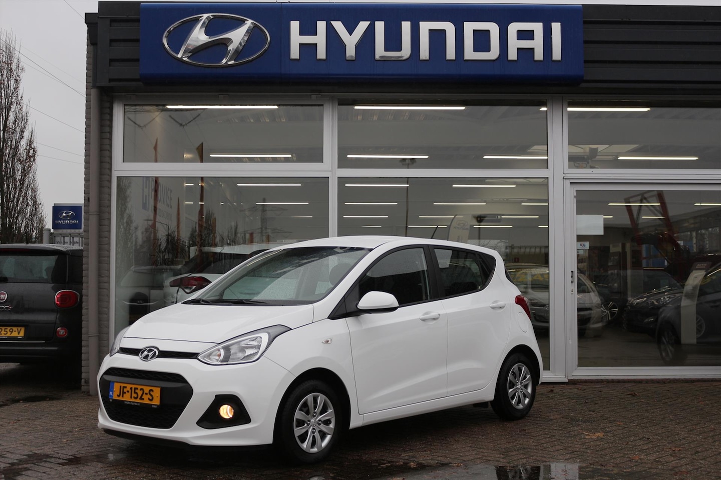 Hyundai i10 - 1.0i 66pk Blue i-MOTION COMFORT + NAVIGATIE - AutoWereld.nl