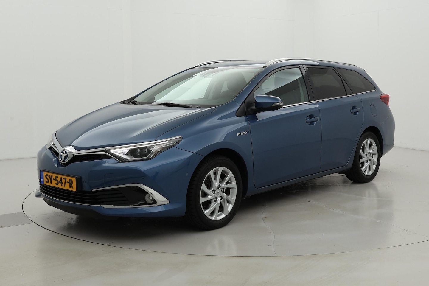 Toyota Auris Touring Sports - 1.8 Hybrid Executive | Trekhaak - AutoWereld.nl