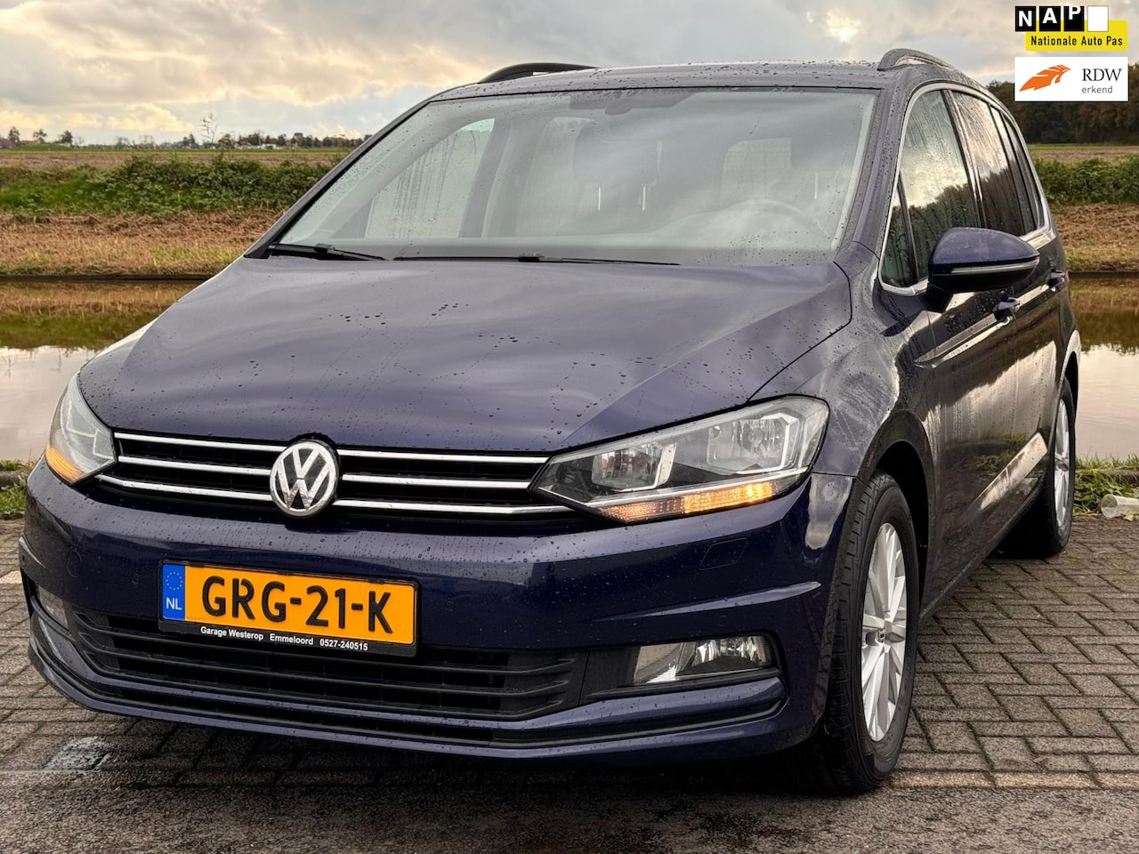 Volkswagen Touran - 1.4 TSI DSG Comfortline Business 7p trekhaak - AutoWereld.nl