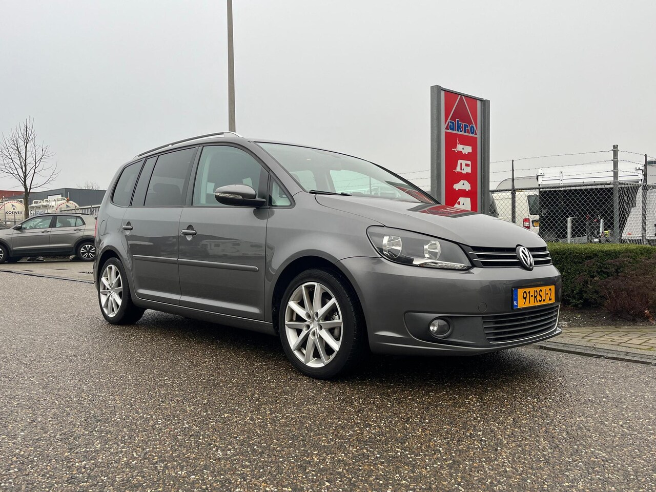 Volkswagen Touran - 1.2 TSI Comfortline BlueMotion | Cruise control | Parkeersensoren achter | NAVI | Trekhaak - AutoWereld.nl