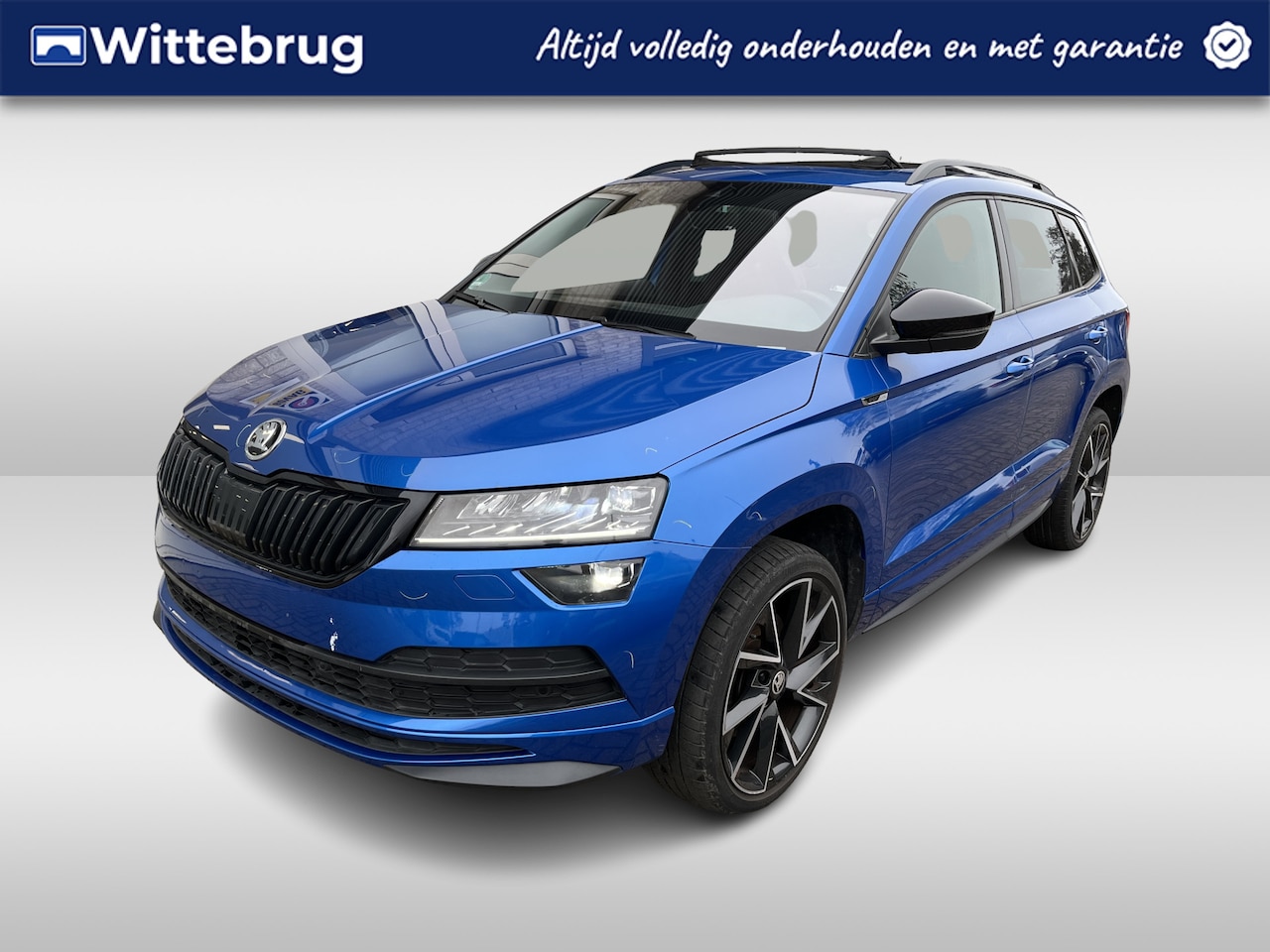 Skoda Karoq - 1.5 TSI ACT Sportline Business / PANO/ KEYLESS/ DIGITAL DASH/ CRUISE/ PARK. SENSOREN/ SMAR - AutoWereld.nl