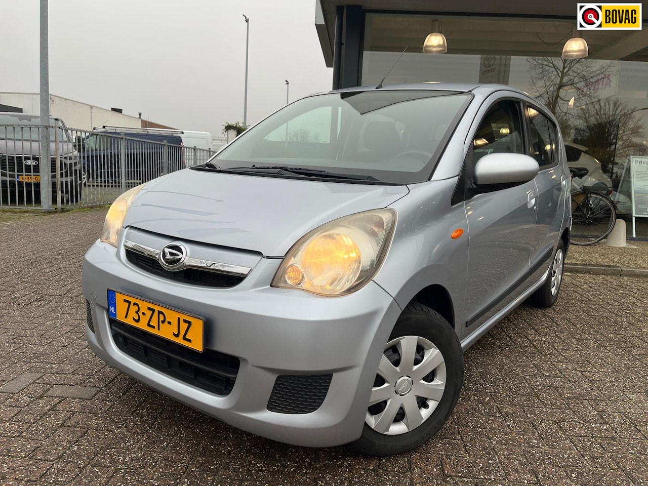 Daihatsu Cuore - 1.0 Premium|Airco|Verschuifbare achterbank - AutoWereld.nl