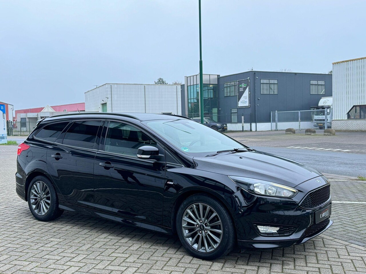 Ford Focus Wagon - 1.5 EcoBoost ST Line 182pk/Navi/Camera/PDC - AutoWereld.nl