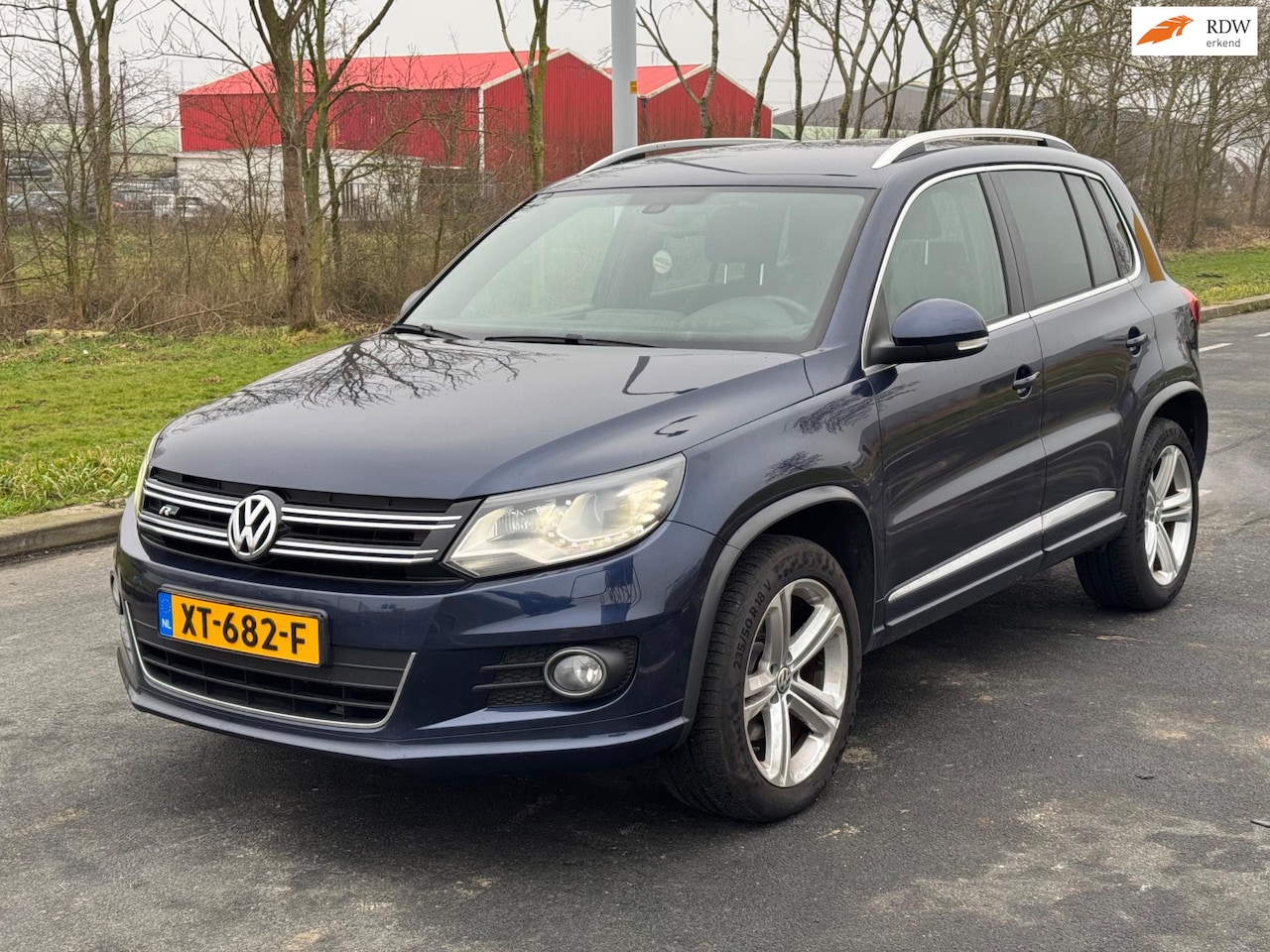 Volkswagen Tiguan - 2.0 TSI Sport&Style 4Motion / R/LINE / DSG / AIRCO - AutoWereld.nl