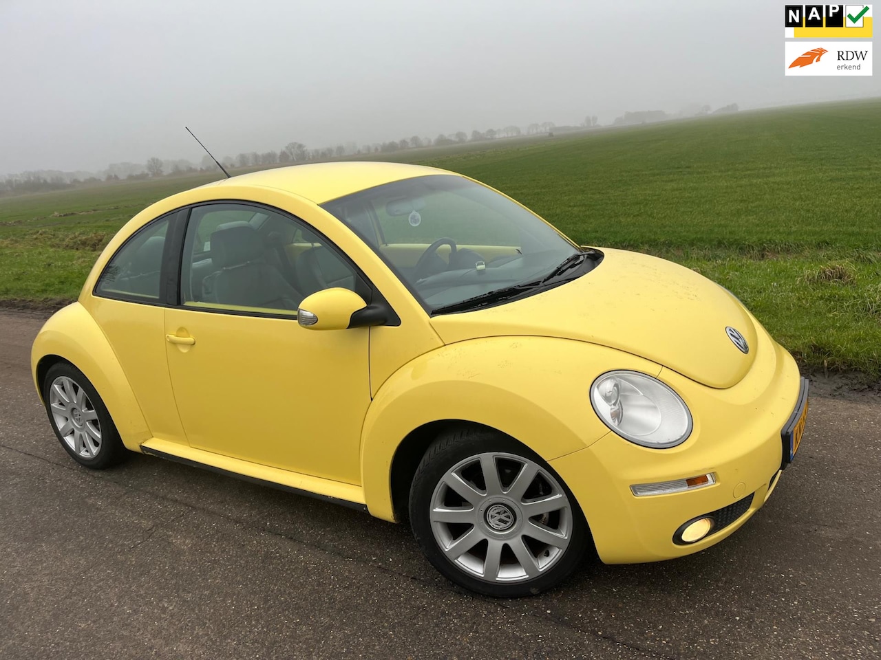 Volkswagen New Beetle - 1.4-16V Trendline / leder airco facelift - AutoWereld.nl