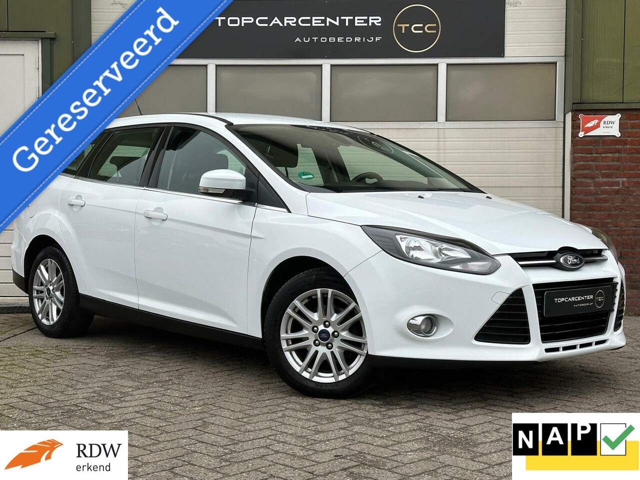 Ford Focus Wagon - 1.0 Titanium/TREKH/PARK/NAVI/CRUISE/APK/NAP - AutoWereld.nl