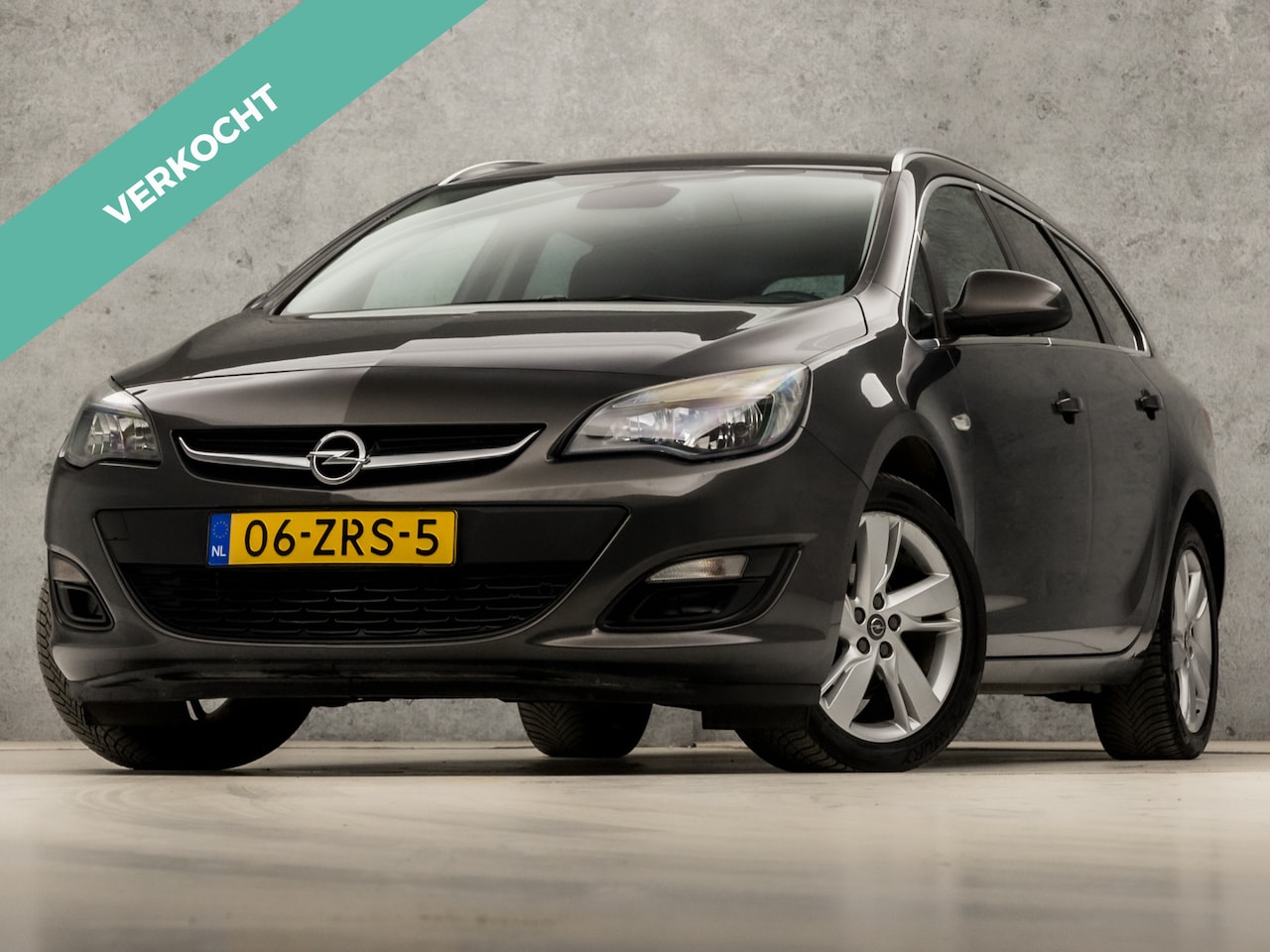 Opel Astra Sports Tourer - 1.4 Turbo Sport 141Pk (NAVIGATIE, CLIMATE, GETINT GLAS, SPORTSTOELEN, TREKHAAK, PARKEERSEN - AutoWereld.nl