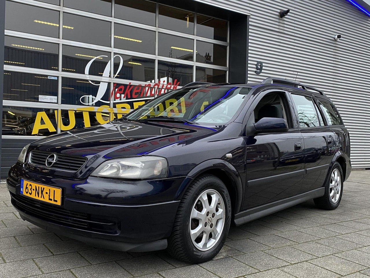 Opel Astra Wagon - 1.6 Njoy - Airco I Sport velgen I Comfort pakket I Trekhaak I - AutoWereld.nl