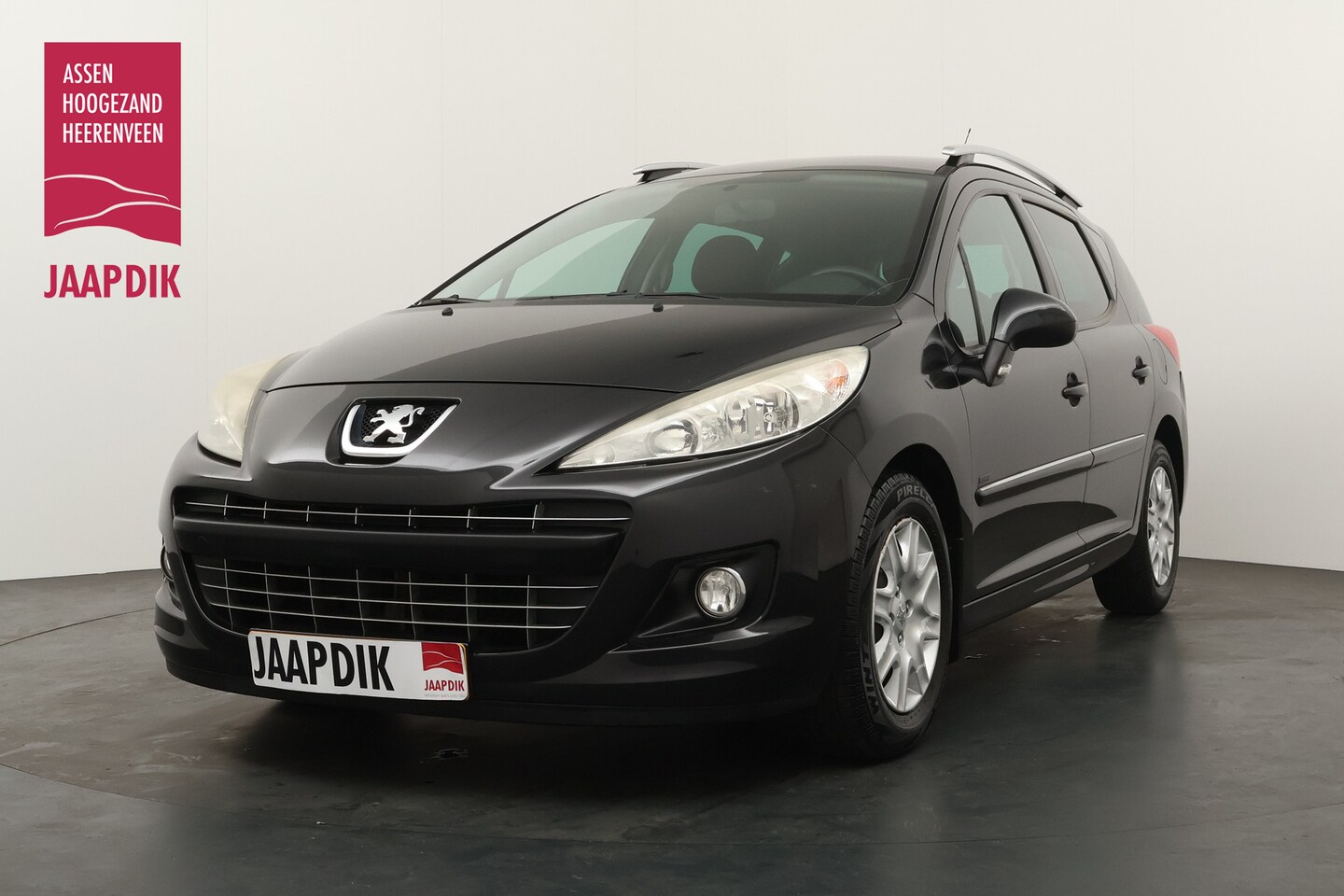 Peugeot 207 SW - BWJ 2011 1.4 VTi 96 PK Sportium TREKHAAK / AIRCO / PRIV. GLAS / CRUISE / STUURBEKRACHTIGIN - AutoWereld.nl