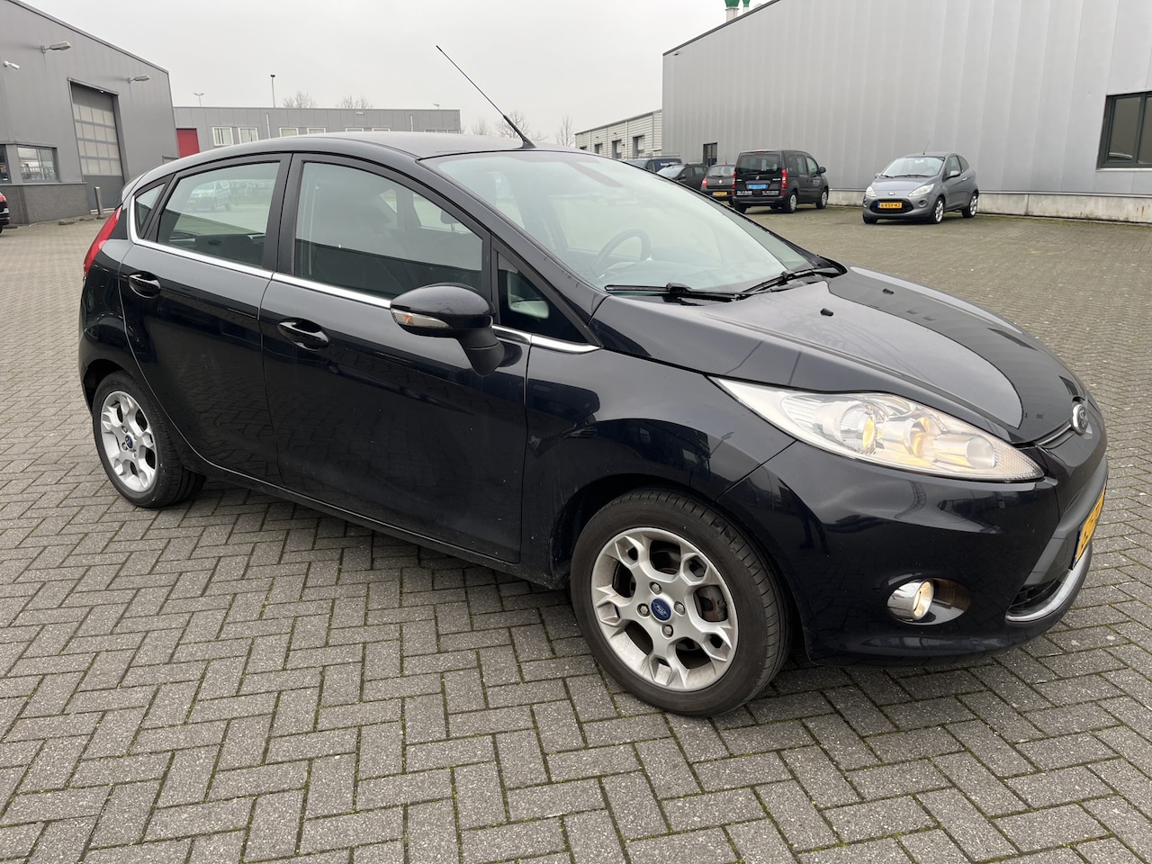 Ford Fiesta - 1.25 Titanium 5 drs 76 dkm - AutoWereld.nl