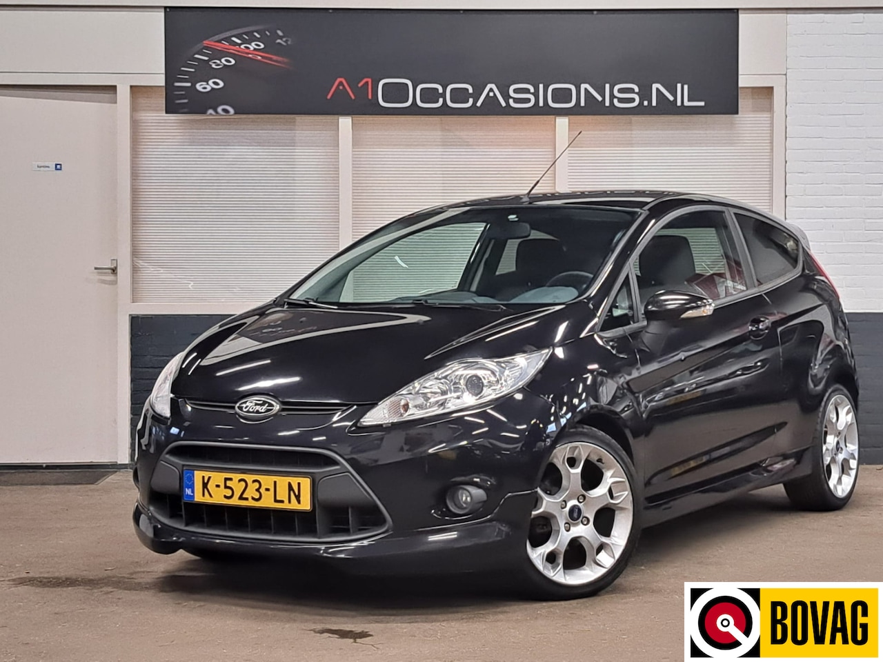 Ford Fiesta - 1.6 Ghia 1.6 Ghia - AutoWereld.nl